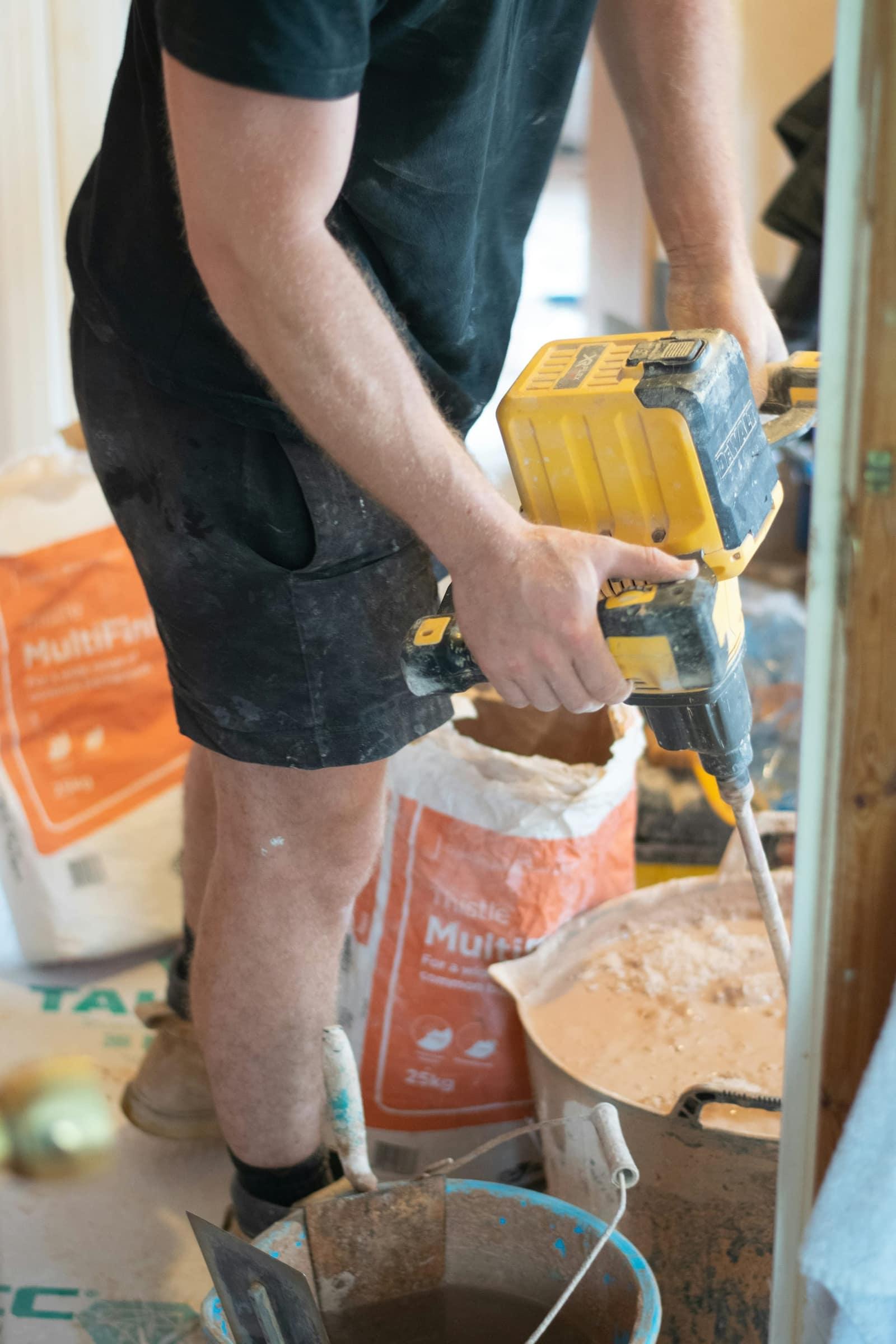 Plasterer at work on a site