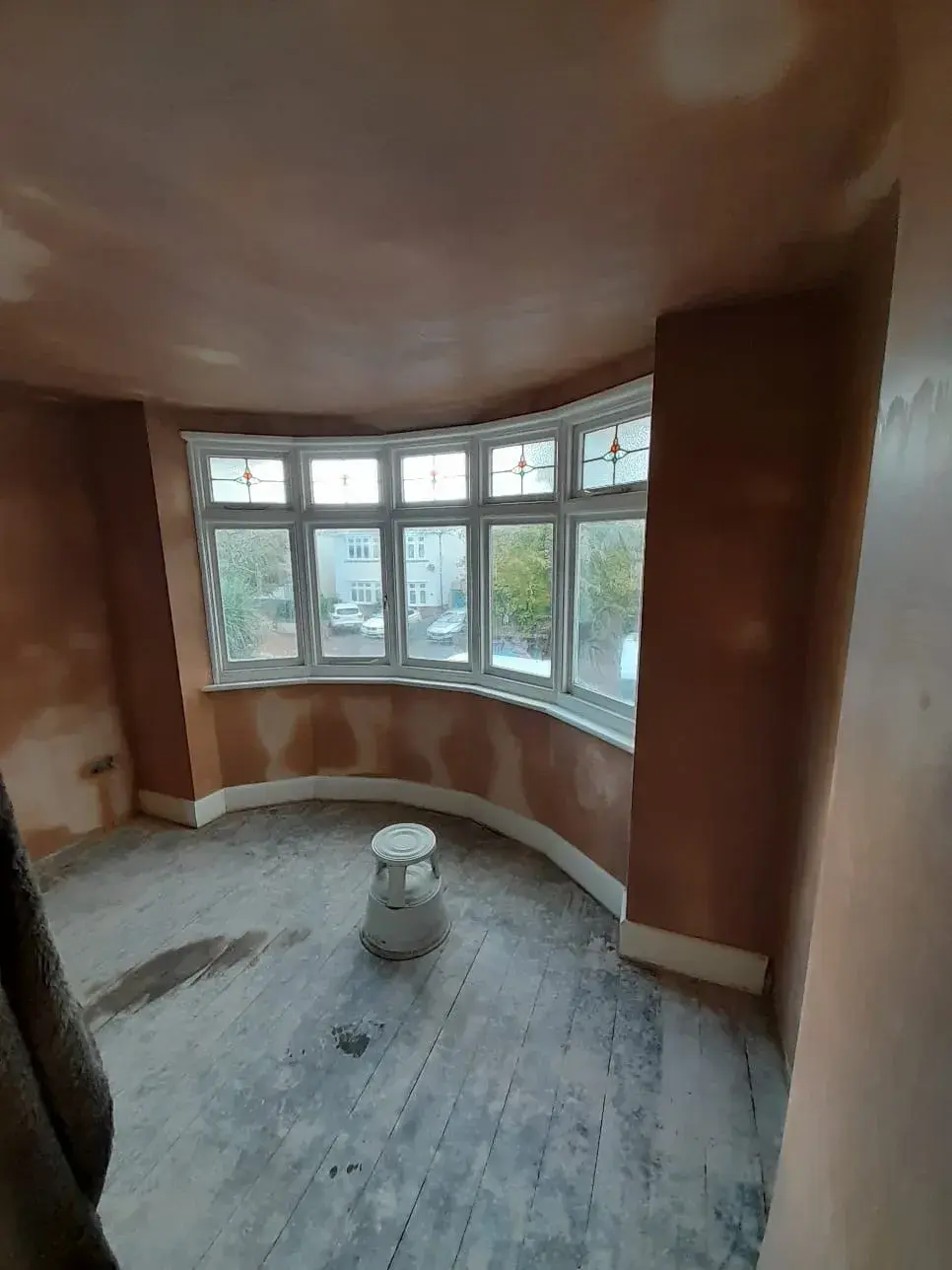 Pearl Plastering bay window with freshly skimmed walls and ceiling in a Bournemouth period property